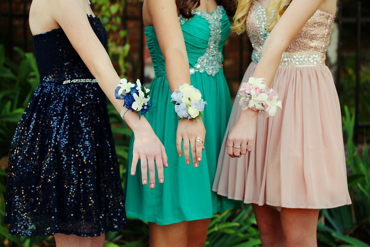 Designed Corsage matching the dress! text pic to 740-975-9856 – XOXO FLORALS & WINE, Newark OH